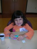 Sara making a flower pot Sara making a flower pot